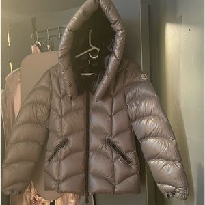 This is an moncler women’s coat get for the winter!! No longer can fit it.